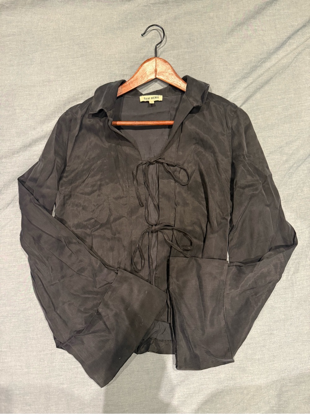 Black tie-front silky feel top from Djerf Avenue